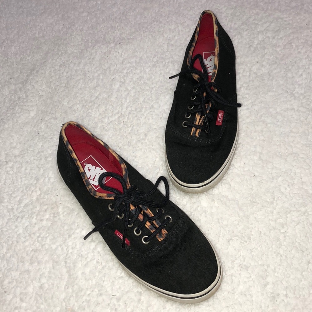 Black Vans with cheetah print edge